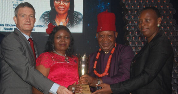 Managing DirectorNigerian Breweries Plc, Nicolaas Vervelde (left),; National Champion of the Distributors Award 2015, Dem Joy Igwe and Sir Gabriel Igwe of Ifeoma Chukwuka Nigeria Limited; and the Nigerian Breweries Managing Director’s wife, Clementine Vervelde at the Distributors’ Award in Lagos…recently